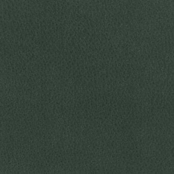 Green woven leather texture sample displaying a matte finish, granular surface, and consistent tone with product code text visible.